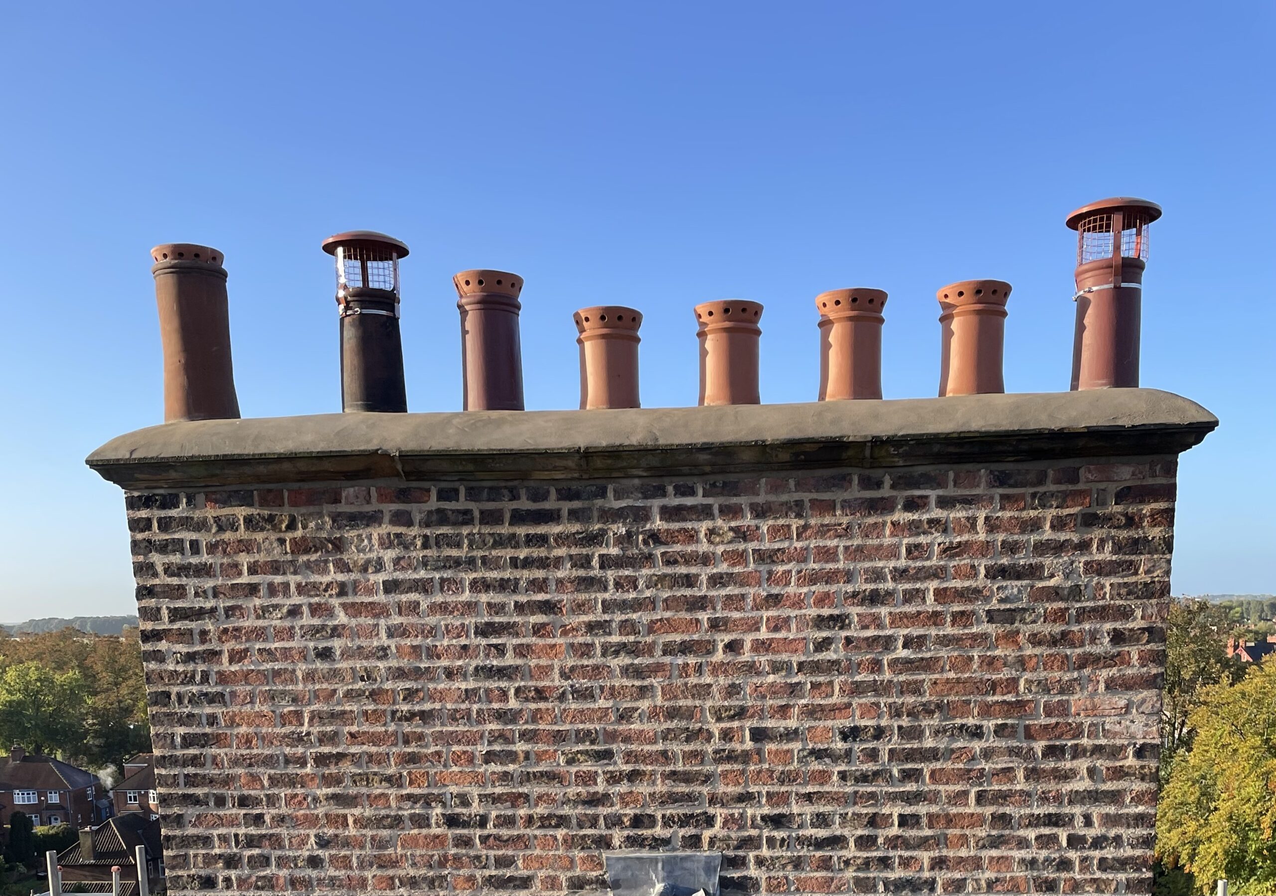 Chimney repair on traditional UK brick chimney